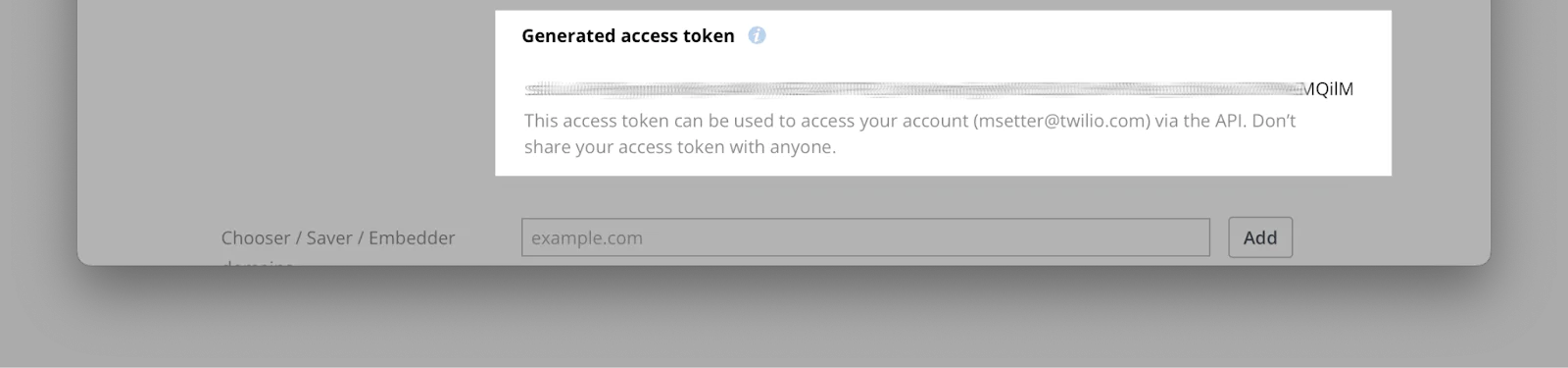 A generated access token displayed on a webpage, with an example URL in the input field below it. A generated access token displayed on a webpage, with an example URL in the input field below it.