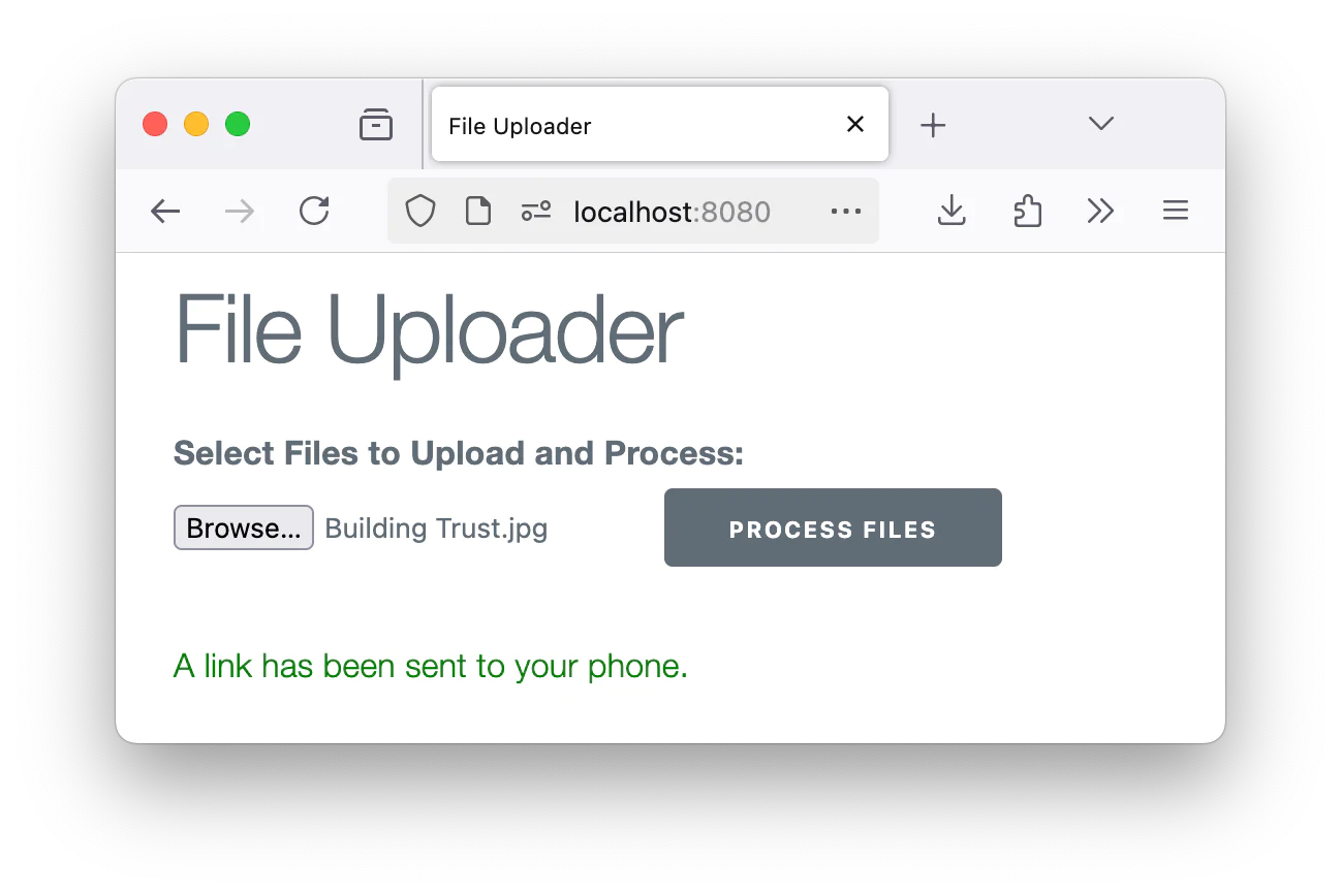 File uploader page with a selected file named Building Trust.jpg and a message stating a link has been sent to your phone. File uploader page with a selected file named Building Trust.jpg and a message stating a link has been sent to your phone.